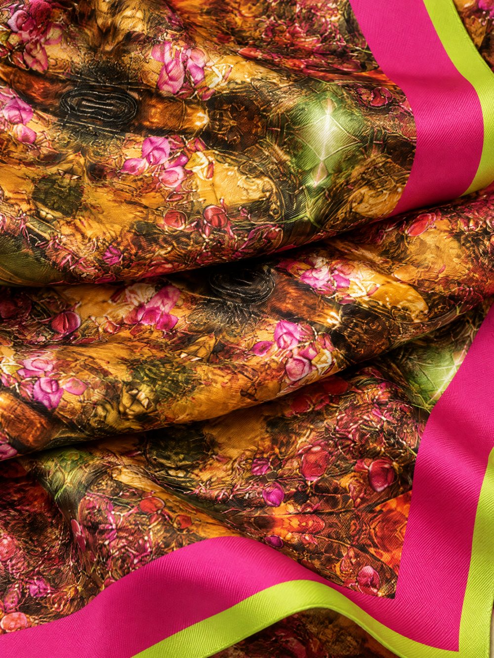 Close-up of A Kaleidoscope of Flowers printed on folded fabric