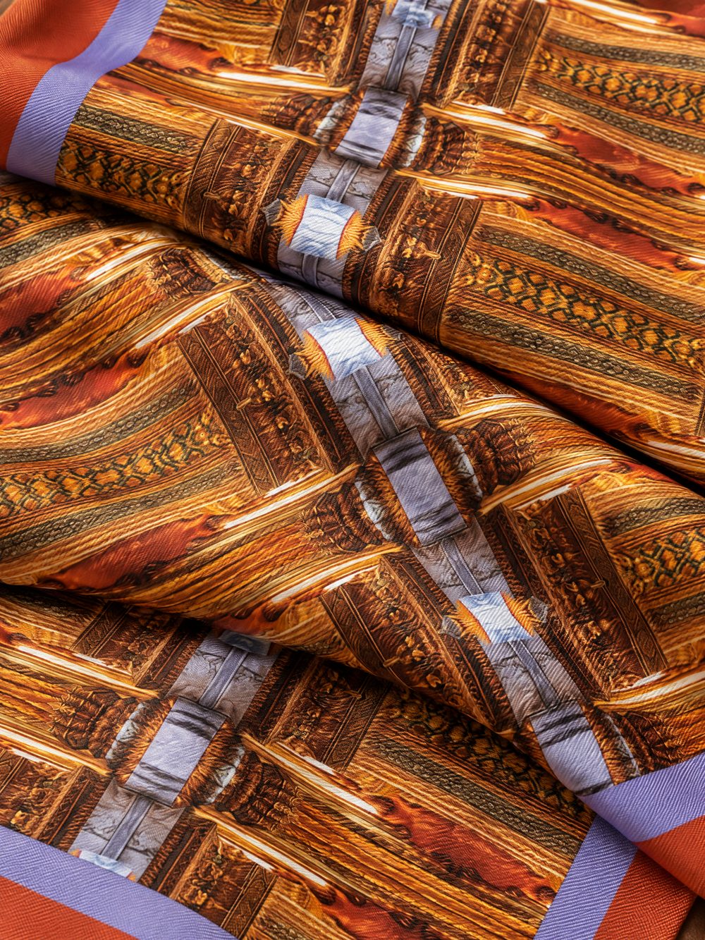Close-up of As Above So Below printed on folded fabric