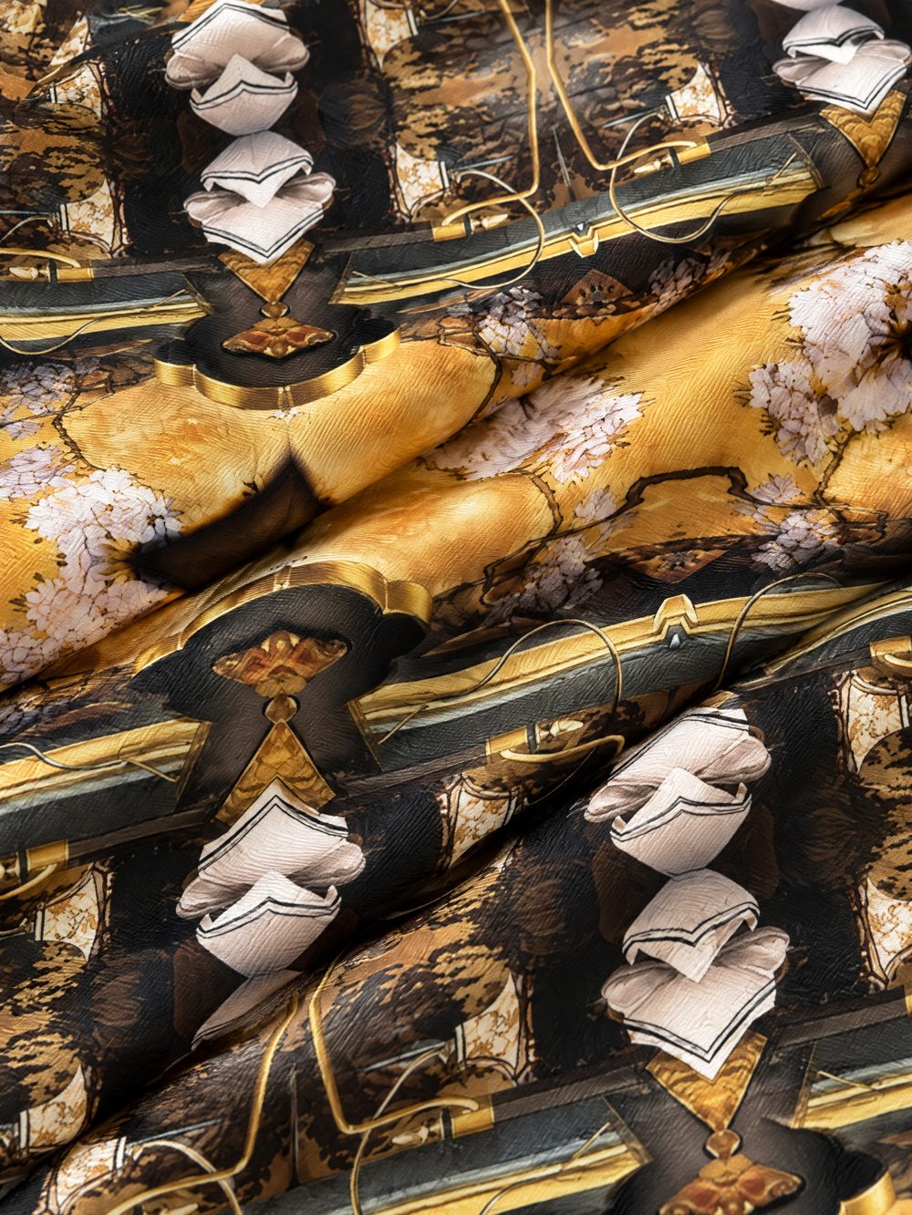 Close-up of Golden Canopy printed on folded fabric