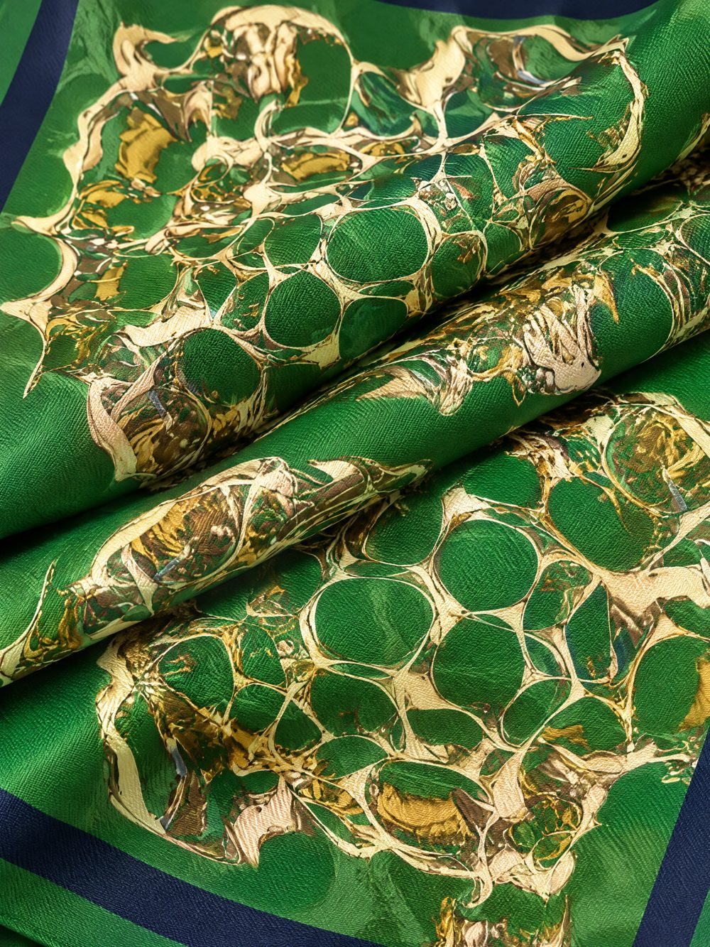 Close-up of Golden Knuckles 2 printed on folded fabric