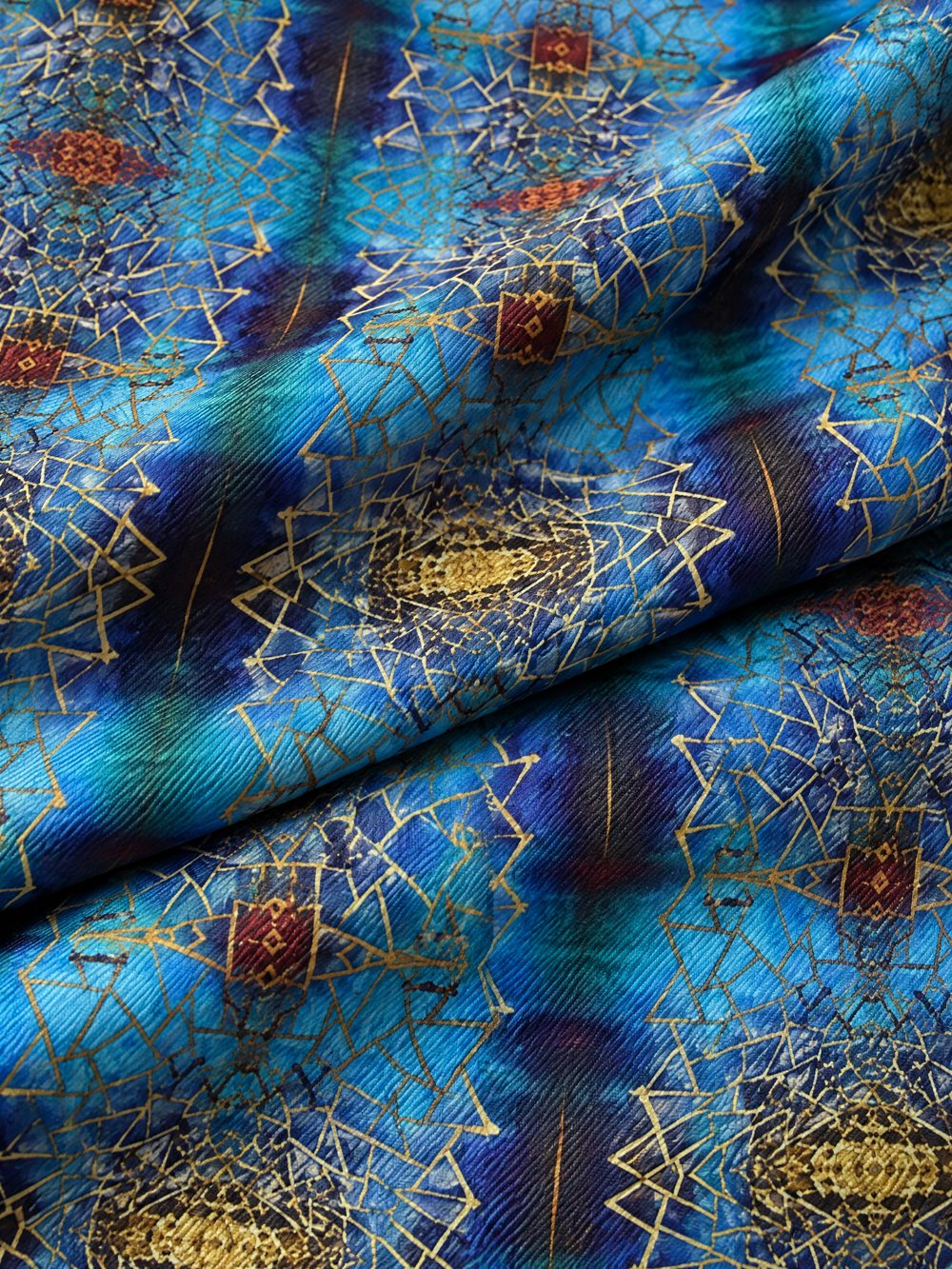 Close-up of Golden Screen Against the Sea printed on folded fabric