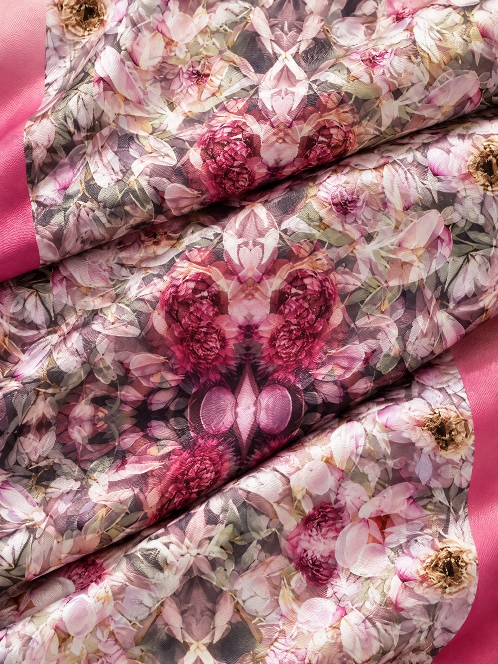 Close-up of Pink Floral Afternoon printed on folded fabric