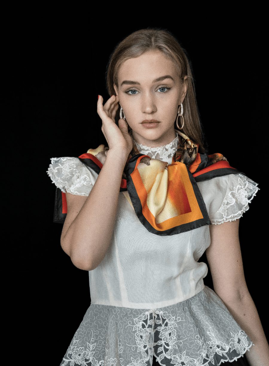 The Phoenix Aflame silk scarf being worn