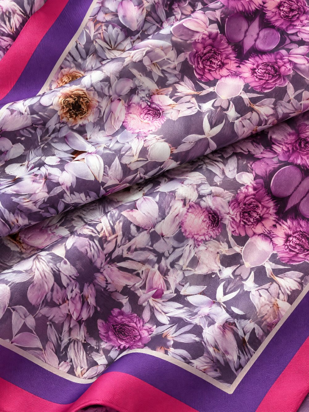 Close-up of Violet Floral Afternoon printed on folded fabric