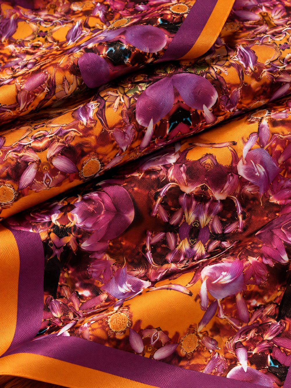 Close-up of Where the Lotus Glows printed on folded fabric